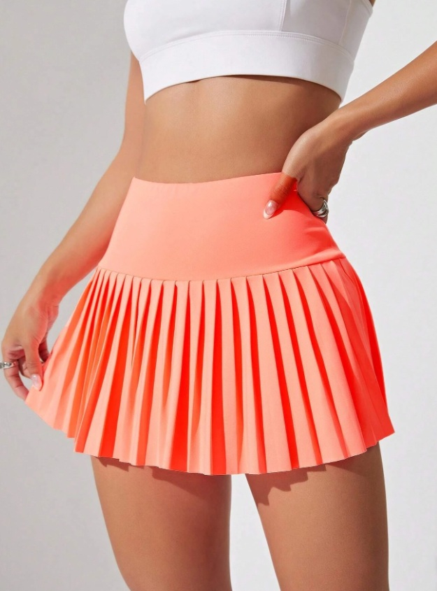 Oranžová sukňa s kraťasami
