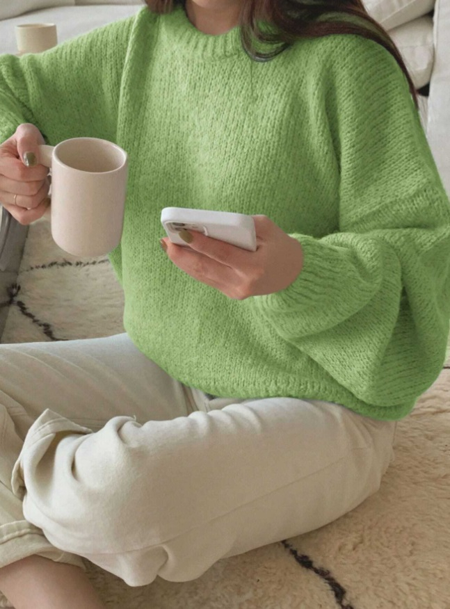 Zelený sveter