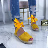 Žlté letné sandálky na viazanie