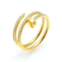 Dámsky oceľový prsteň klinec gold-273438-02